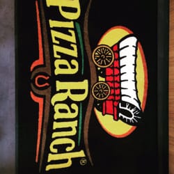 Pizza Ranch - Welcome mat in front of counter.