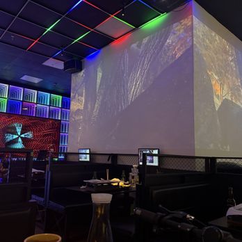 Xinjiang BBQ - Wall projections. Surreal. - Asian Fusion Near Me - San Diego, California Xinjiang BBQ - Wall projections. Surreal. - Asian Fusion Near Me - San Diego, California
