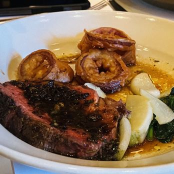 Chez Panisse - Grilled grass fed rib eye with fried onion rings, Tokyo turnips, and tapenade ($45) - New American Near Me - Berkeley, California