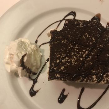 Assaggio - Kapolei - Tiramisu don't mind the bite missing my daughter got to it before I could snap a picture! - Italian Near Me - Kapolei, Hawaii Assaggio - Kapolei - Tiramisu don't mind the bite missing my daughter got to it before I could snap a picture! - Italian Near Me - Kapolei, Hawaii