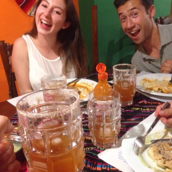 Ranchito Mexicano - My happy friends with our good food and Mexican micheladas (the drinks!) - Mexican Near Me - Granada, GR