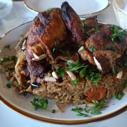 Ayat - Maklouba, a delicious chicken and rice dish with vegetables
