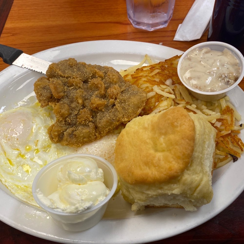 Country fried steak with eggs and hash browns Country fried steak with eggs and hash browns