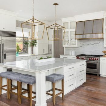 312 Kitchen & Bath - a white kitchen with a marble island - Kitchen & Bath Near Me - Chicago, Illinois