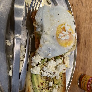 Green Sage Cafe - Downtown - Everything Avocado toast with a farm egg and sheep's milk feta! - Coffee & Tea Near Me - Asheville, North Carolina