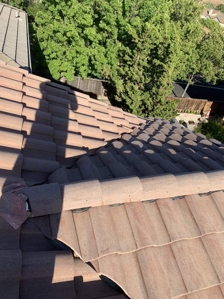 Slide of SD Gutters and Roofing