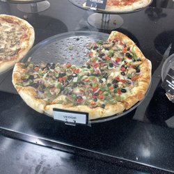 DK - view of freshly-made pizzas