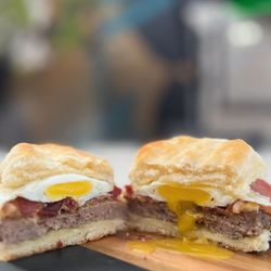 Alarado Biscuit Company - Sausage bacon, breakfast sandwich on a biscuit with a fried egg