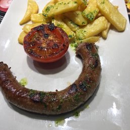 Spanish sausage with fries. I think it was 14 euros. It was okay Spanish sausage with fries. I think it was 14 euros. It was okay