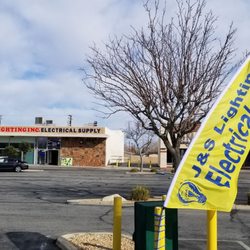 J&S lighting inc Electrical supply - They added new flags for advertising