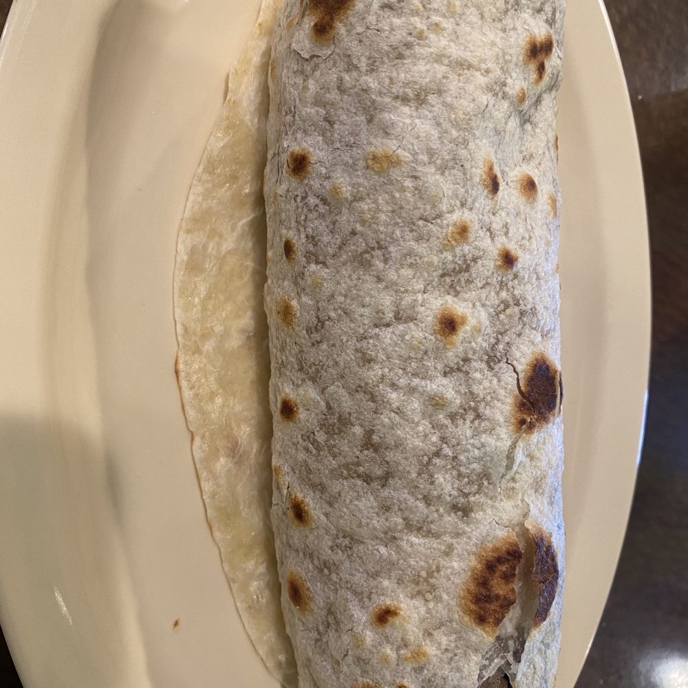 Asada burrito (ordered with rice addition for $1 so it might be smaller as a regular burrito) Asada burrito (ordered with rice addition for $1 so it might be smaller as a regular burrito)