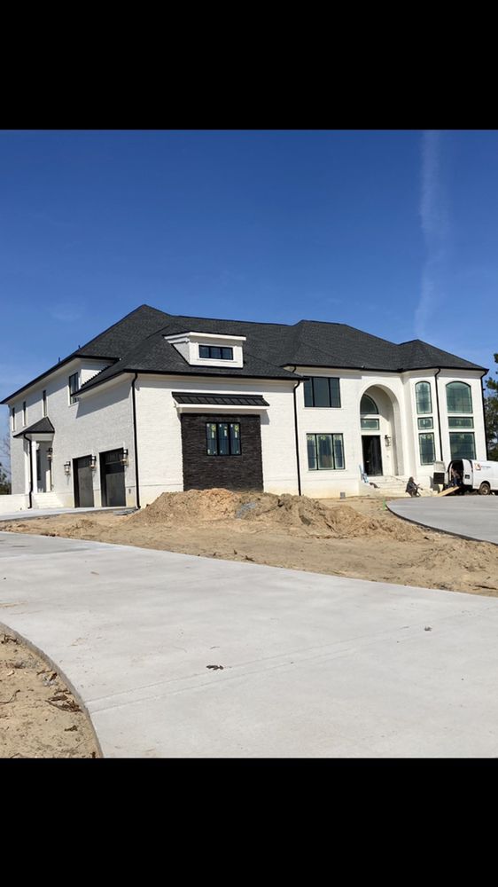 Slide of Gutter Guys Construction