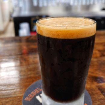 The Growler Stop - a glass of beer on a coaster - Beer, Wine & Spirits Near Me - Cincinnati, Ohio The Growler Stop - a glass of beer on a coaster - Beer, Wine & Spirits Near Me - Cincinnati, Ohio