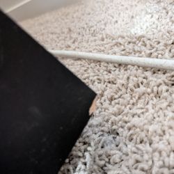 The chunk on rear right footing - delivery driver took same picture when dresser was unpackaged. Zero follow up from AFA.