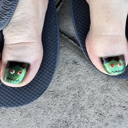 Nail Oasis & Spa - Getting my toes ready for Halloween. I show Lani a picture I would like on my toes and bam it's done. Thank you for being you!!!