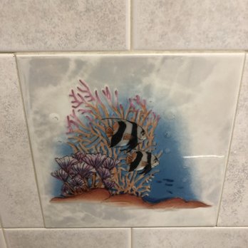 Yasotorn Thai Cusine - tropical fish in the women's restroom - Thai Near Me - Evanston, Illinois Yasotorn Thai Cusine - tropical fish in the women's restroom - Thai Near Me - Evanston, Illinois