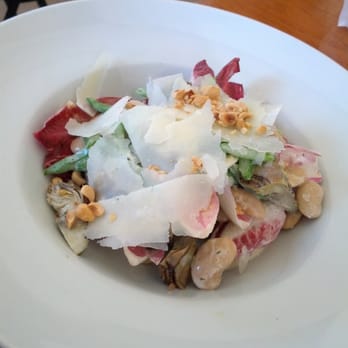Firma Pekelhaaring - Vegetable salad consisting of grilled artichoke hearts, radicchio, baby string beans, hazelnuts, shaved parmesan. - Italian Near Me - Amsterdam, New Hampshire