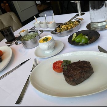 Bourbon Steak - filet mignon, barrel-cut filet mignon, oscar style crab, creamed spinach, roasted mushrooms, sauce trio - Steakhouses Near Me - Glendale, California