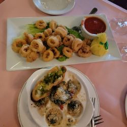The Grand Cafe - CRISPY CALAMARI sweet Peppers, Cherry Tomato, Capers, Homemade Pomodoro Sauce, and GRATINEE OF ESCARGO