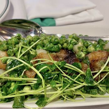 Smith & Wollensky - Burlington - CHARRED CIPOLLINI ONION & PEAS - New American Near Me - Burlington, Massachusetts Smith & Wollensky - Burlington - CHARRED CIPOLLINI ONION & PEAS - New American Near Me - Burlington, Massachusetts