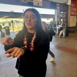 Sydney sporting her lei Sydney sporting her lei