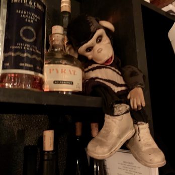 Ruins - Monkey hangs out on a shelf. - Cocktail Bars Near Me - Spokane, Washington Ruins - Monkey hangs out on a shelf. - Cocktail Bars Near Me - Spokane, Washington