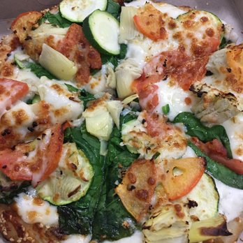 Uptown Pizza - Individual California Veggie. White sauce with garlic, zucchini, spinach, tomato and artichoke. Topped with Parmesan and mozzarella cheese. - Pizza Near Me - Oxnard, California Uptown Pizza - Individual California Veggie. White sauce with garlic, zucchini, spinach, tomato and artichoke. Topped with Parmesan and mozzarella cheese. - Pizza Near Me - Oxnard, California