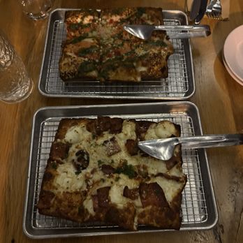 Emmy Squared Pizza - Germantown - MVP pizza (top) and Miranda Pizza (bottom) - Pizza Near Me - Nashville, Tennessee Emmy Squared Pizza - Germantown - MVP pizza (top) and Miranda Pizza (bottom) - Pizza Near Me - Nashville, Tennessee