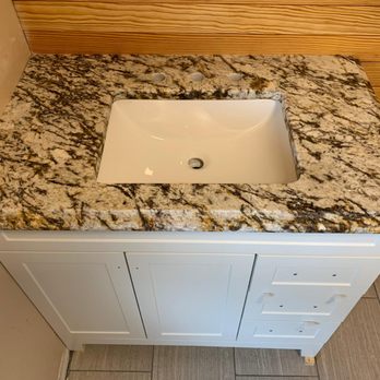 Top Stone Design - a bathroom vanity with a sink - General Contractors Near Me - Richmond, Virginia Top Stone Design - a bathroom vanity with a sink - General Contractors Near Me - Richmond, Virginia