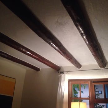Old Taos Guesthouse - This is a real, 180 year old pueblo with cool ceiling beams to prove it. - Hotels Near Me - Taos, New Mexico Old Taos Guesthouse - This is a real, 180 year old pueblo with cool ceiling beams to prove it. - Hotels Near Me - Taos, New Mexico