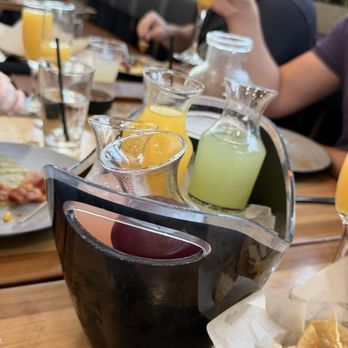 Flecha Cantina - Mimosa bucket with various juices - Mexican Near Me - Huntington Beach, California Flecha Cantina - Mimosa bucket with various juices - Mexican Near Me - Huntington Beach, California