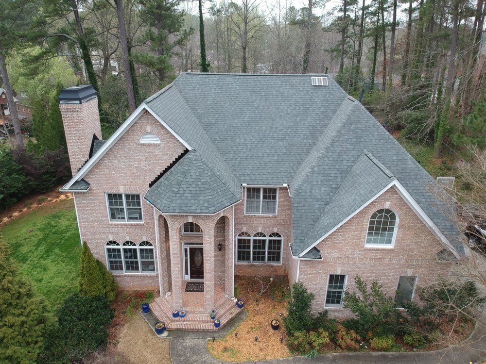 Slide of RST Roofing and Renovations