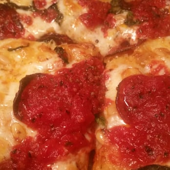 Buddy's Pizza - Dearborn - Pizza zooming - Pizza Near Me - Dearborn, Michigan