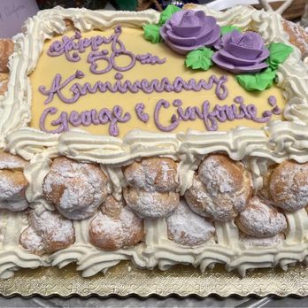 Mazzetti's Bakery - 50th Anniversary Saint Honore with Cream puffs filled with rum custard. Excellent cake! - Bakeries Near Me - Pacifica, California Mazzetti's Bakery - 50th Anniversary Saint Honore with Cream puffs filled with rum custard. Excellent cake! - Bakeries Near Me - Pacifica, California
