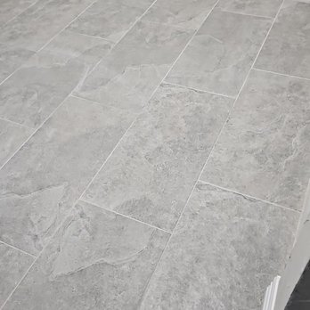 Flooring Warehouse - a tile floor in a room - Flooring Near Me - Houston, Texas Flooring Warehouse - a tile floor in a room - Flooring Near Me - Houston, Texas