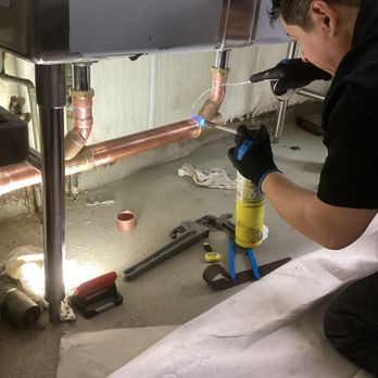 Rescue Plumbing - Quality craftsmanship in every detail. Our technician carefully soldering copper pipes for a lasting installation. - Plumbing Near Me - Chicago, Illinois