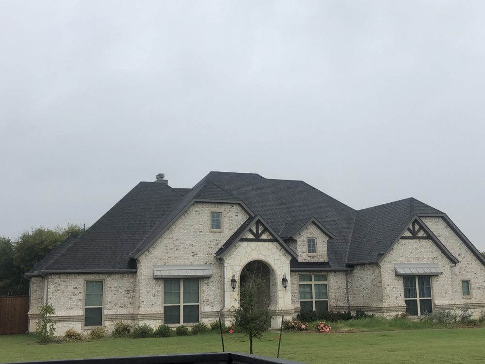 Slide of J&K Roofing and Construction