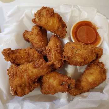 Village Pizza and Seafood - Fried wings with a side of buffalo sauce - Pizza Near Me - Pasadena, Texas Village Pizza and Seafood - Fried wings with a side of buffalo sauce - Pizza Near Me - Pasadena, Texas