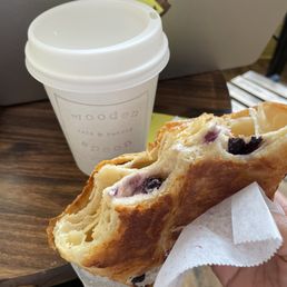 Half eaten blueberry cream cheese croissant lol. Very tasty! And a small spicy chai tea^ Half eaten blueberry cream cheese croissant lol. Very tasty! And a small spicy chai tea^
