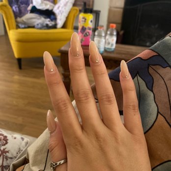 NuTrends Nails & Spa - You can see my crooked nails and parts she didn't push all the way back and the off center rhinestone. Overall pretty. - Nail Salons Near Me - Tempe, Arizona