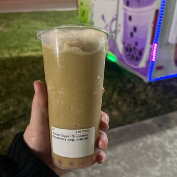 Tealiteful Bubble Tea - a person holding a cup - Bubble Tea Near Me - Kendale Lakes, Florida Tealiteful Bubble Tea - a person holding a cup - Bubble Tea Near Me - Kendale Lakes, Florida
