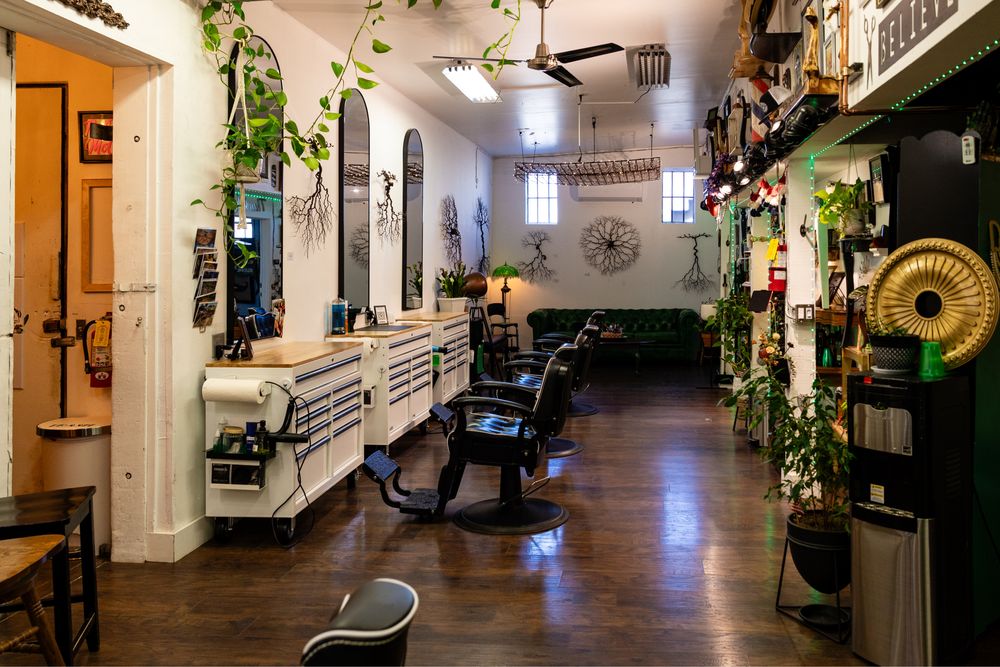The Real McCoy Barbershop Logo