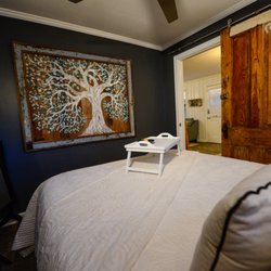 Decatur Alpaca Cottage - Commissioned by well known folk artist Brian Bohanan, this tree hangs in the cottage bedroom. More Bohanan pieces throughout the cottage