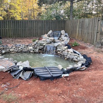 Luxury Landscapes - Koi pond - Landscaping Near Me Luxury Landscapes - Koi pond - Landscaping Near Me
