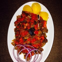 African Fusion Restaurant - Suya- beef or chicken kabob. Mild or spicy.