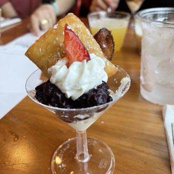 Ruby Sunshine Franklin - Seasonal beignet with pig candy bacon - Breakfast & Brunch Near Me - Franklin, Tennessee Ruby Sunshine Franklin - Seasonal beignet with pig candy bacon - Breakfast & Brunch Near Me - Franklin, Tennessee