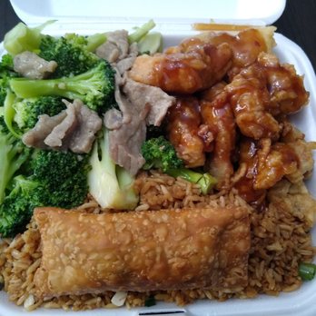 Hung Fatt - Combination Plate #10. Beef and broccoli, General Tao's Chicken, chicken fried rice and an egg roll. $14.95. - Chinese Near Me - Ottawa, Ontario