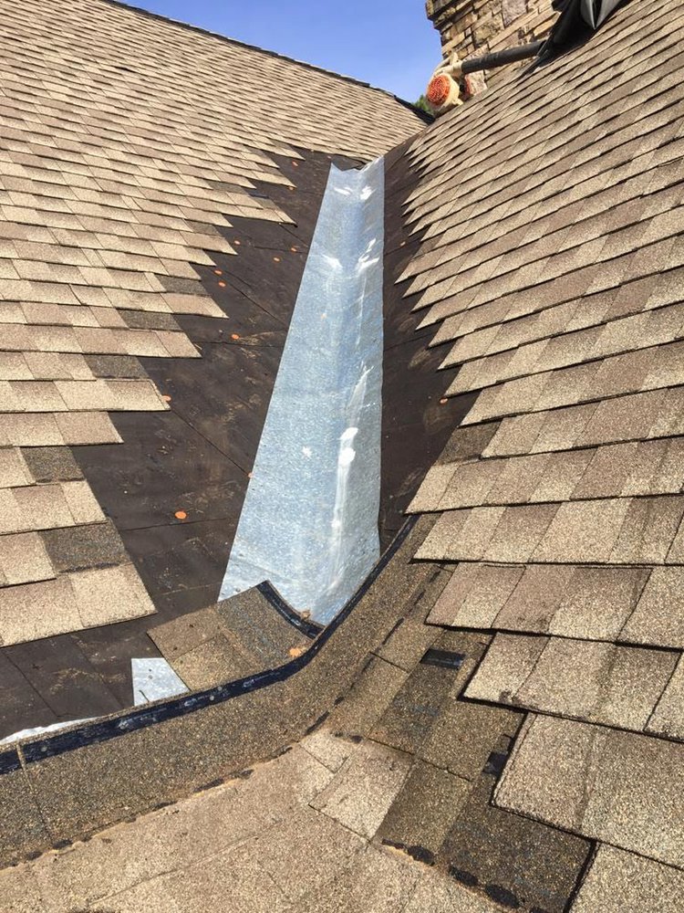 Slide of Rocco’s Roofing