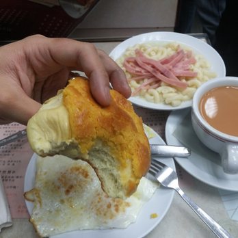 金鳳茶餐廳 - Oh man.  The quintessential HK breakfast.  Macaroni soup, fried eggs, a cup of silky milk tea, and a bolo bun. - Hong Kong Style Cafe Near Me - Hong Kong, HK