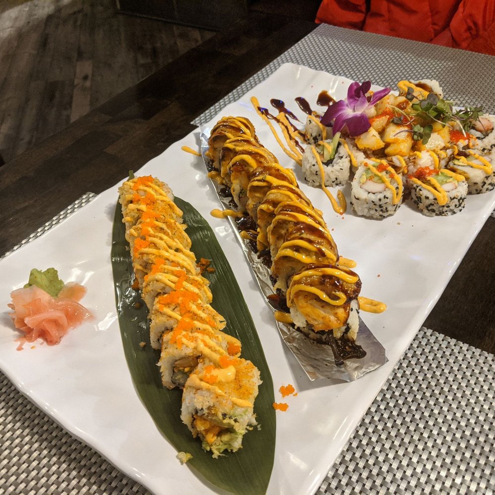 Omakase - Front roll is lobster crunch, middle roll (best) 815 roll, last was omakase roll (2nd best and good spice) - Sushi Bars Near Me - Rockford, Illinois Omakase - Front roll is lobster crunch, middle roll (best) 815 roll, last was omakase roll (2nd best and good spice) - Sushi Bars Near Me - Rockford, Illinois